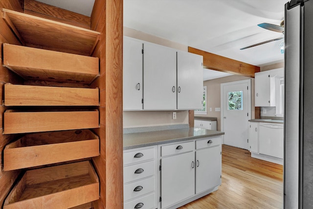 kitchen featuring white cabinetry, dishwasher, ceiling fan, and light hardwood / wood-style floors