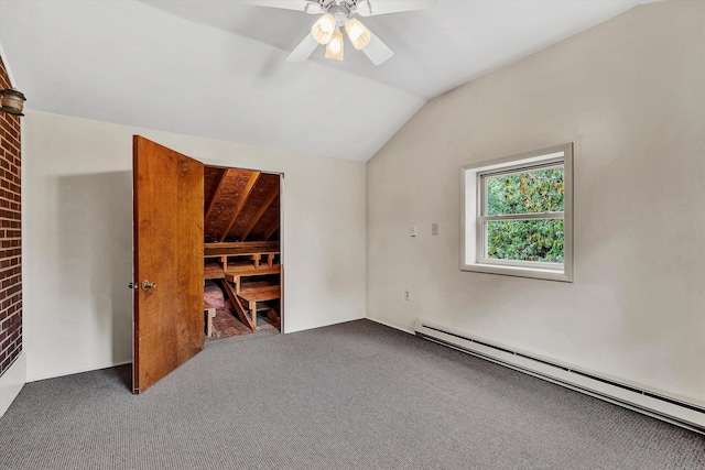 carpeted empty room featuring ceiling fan, vaulted ceiling, and a baseboard radiator