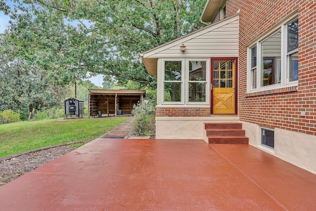 view of patio / terrace with a storage unit