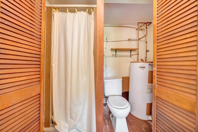 bathroom with wood-type flooring, toilet, and water heater