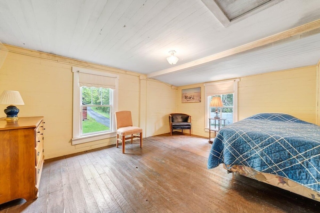 bedroom with hardwood / wood-style flooring