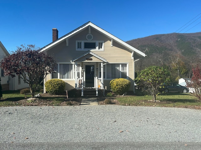 bungalow-style house featuring a mountain view