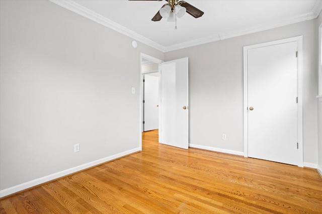 unfurnished bedroom with light wood-type flooring, ceiling fan, and crown molding