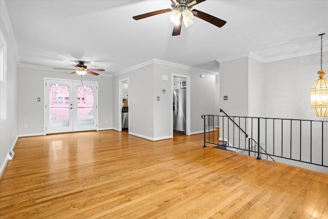 unfurnished room featuring french doors, light hardwood / wood-style floors, ceiling fan, and crown molding