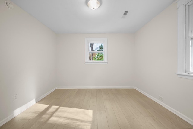 empty room with light wood-type flooring