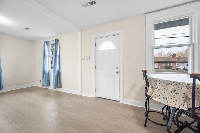 foyer entrance featuring light hardwood / wood-style flooring