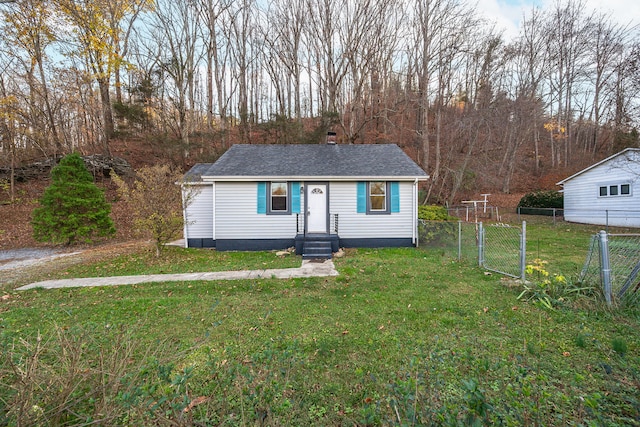 view of front of home with a front yard