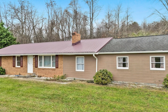 exterior space with a front lawn