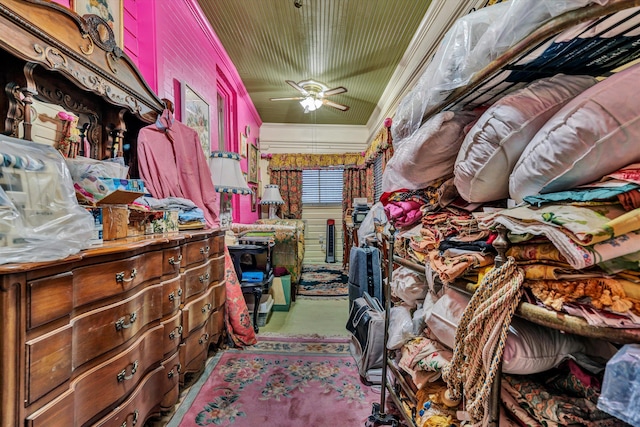 misc room with light carpet, ceiling fan, and ornamental molding