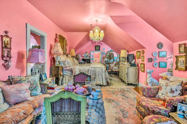 bedroom featuring lofted ceiling and a chandelier