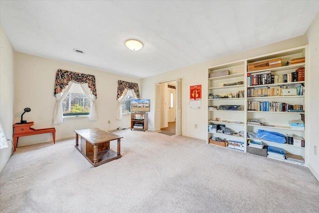 sitting room with light carpet