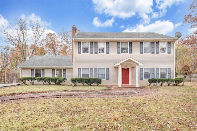 colonial house with a front lawn