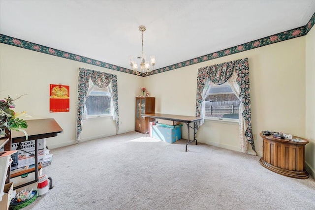 miscellaneous room with light carpet and a chandelier