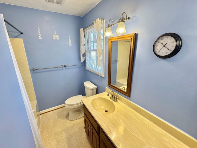 full bathroom with tile patterned flooring, shower / tub combination, vanity, and toilet