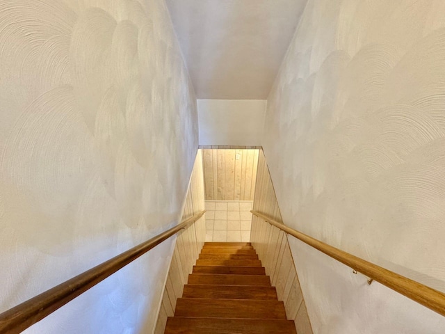 stairway featuring hardwood / wood-style floors