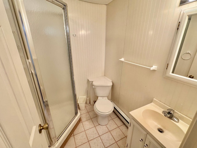 bathroom with a baseboard radiator, tile patterned flooring, an enclosed shower, toilet, and vanity