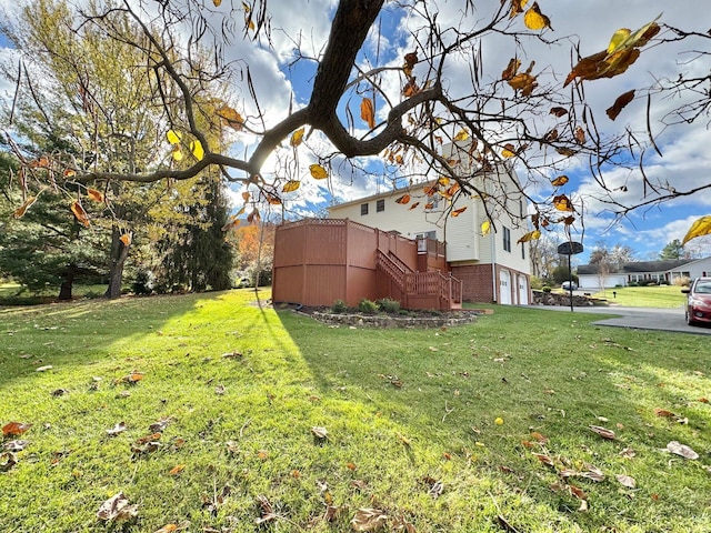 view of yard with a garage