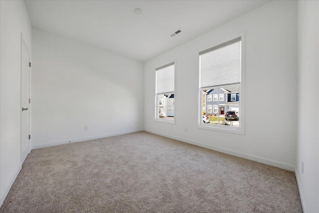 view of carpeted spare room