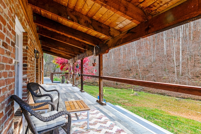 view of patio featuring a porch