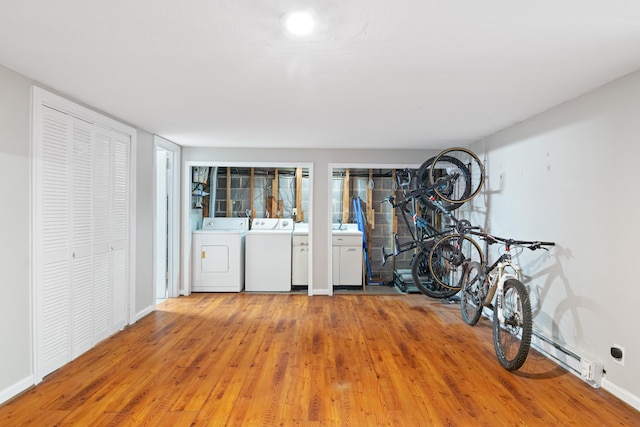 interior space featuring washer and dryer and hardwood / wood-style floors