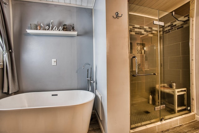 bathroom with hardwood / wood-style floors, plus walk in shower, and wooden ceiling