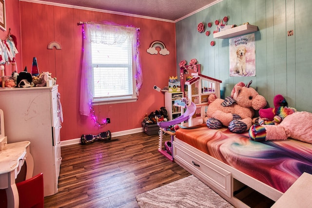 bedroom featuring dark hardwood / wood-style flooring, wooden walls, and ornamental molding