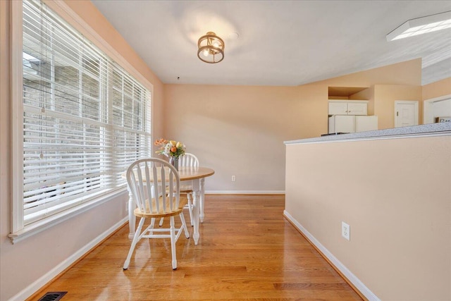 dining area featuring light hardwood / wood-style flooring