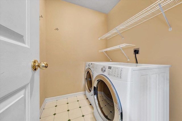 laundry room featuring independent washer and dryer