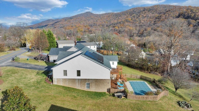 drone / aerial view featuring a mountain view