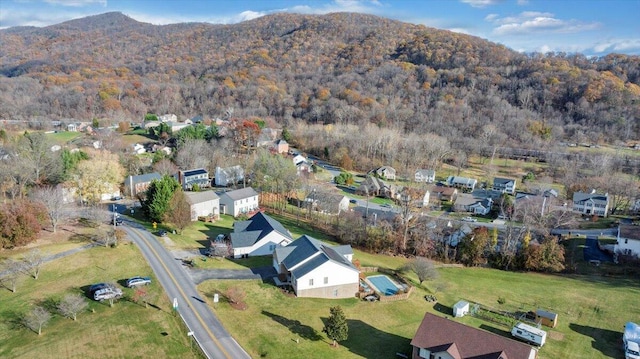 birds eye view of property featuring a mountain view