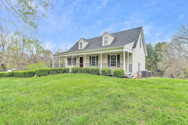 cape cod house with central AC, a porch, and a front yard