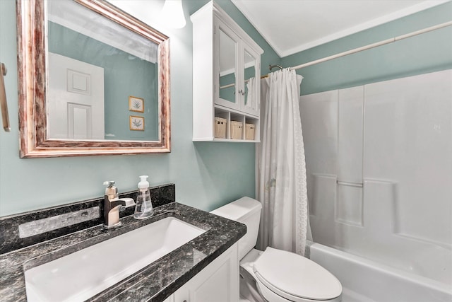 full bathroom featuring vanity, ornamental molding, shower / tub combo, and toilet