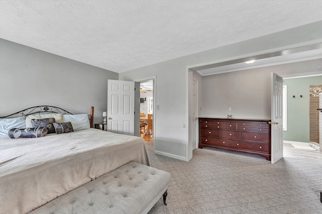 carpeted bedroom with a textured ceiling