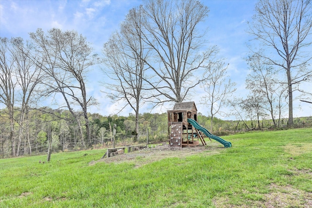 view of play area with a yard