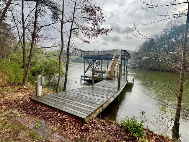 dock area with a water view