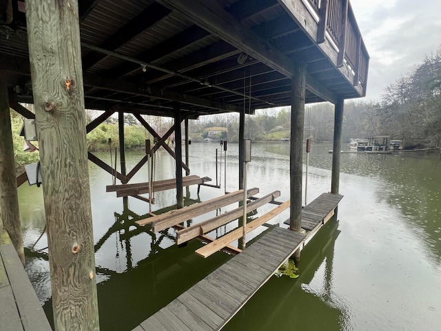 dock area featuring a water view