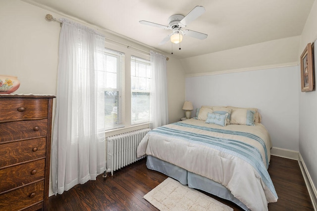 bedroom featuring ceiling fan, dark hardwood / wood-style flooring, and radiator