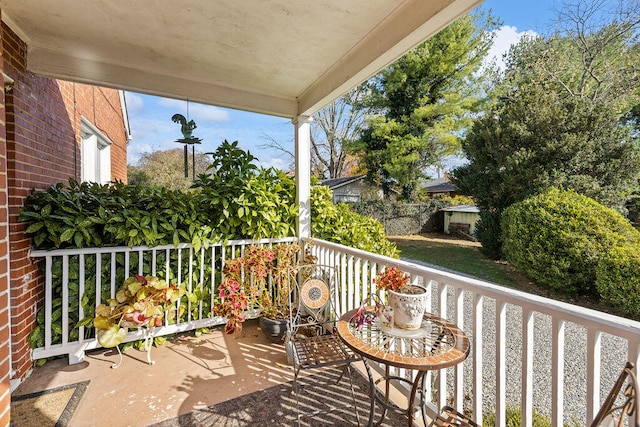 balcony featuring a porch