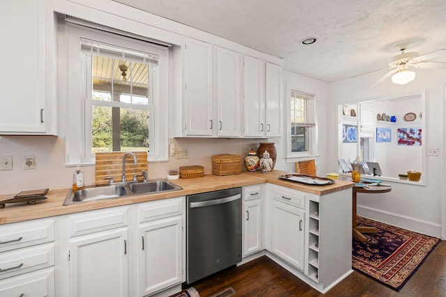 kitchen with ceiling fan, dishwasher, sink, dark hardwood / wood-style flooring, and white cabinets