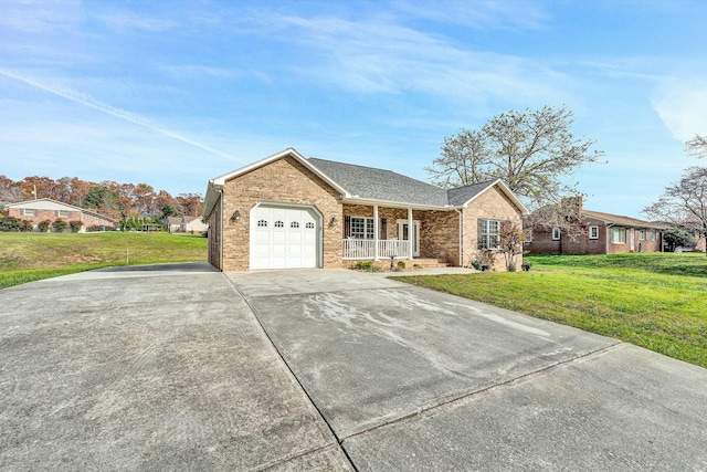 single story home with a front yard, a porch, and a garage