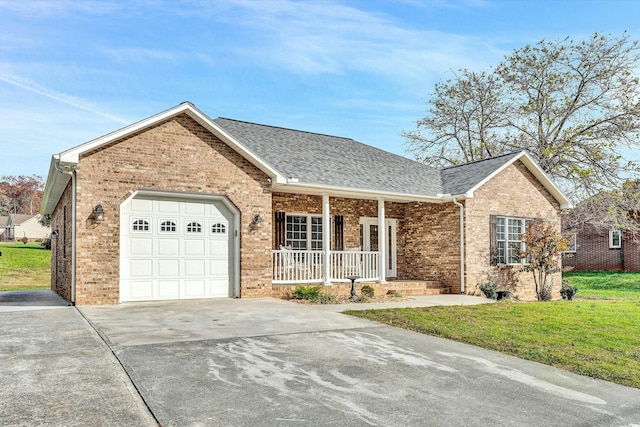 ranch-style house featuring a front lawn, a porch, and a garage