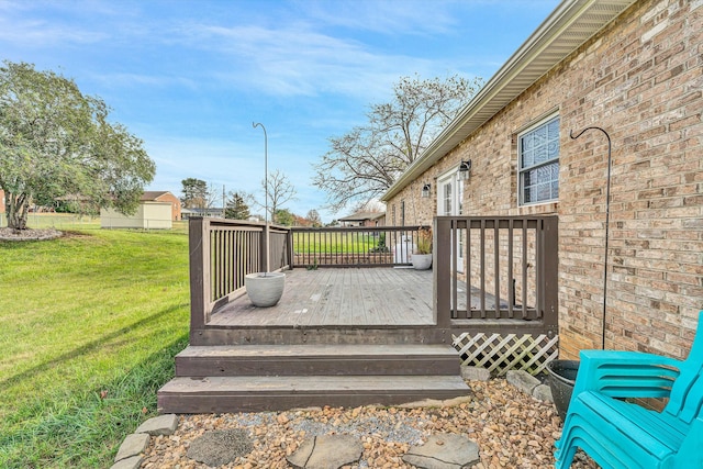 deck featuring a yard