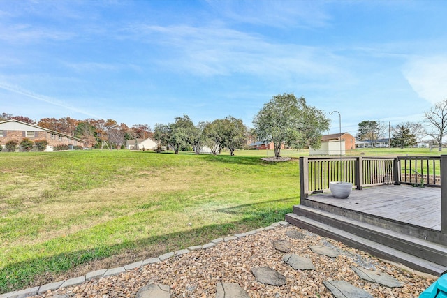 view of yard featuring a wooden deck