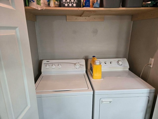 washroom featuring separate washer and dryer