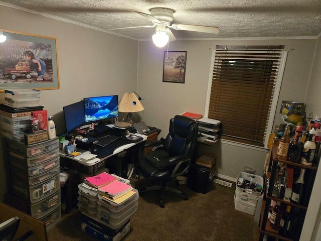 office with ornamental molding, carpet flooring, ceiling fan, and a textured ceiling