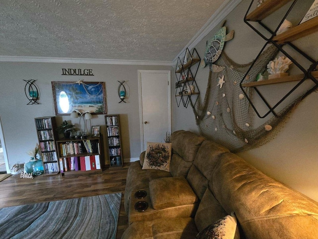 living room with hardwood / wood-style flooring, ornamental molding, and a textured ceiling