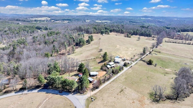 aerial view with a forest view and a rural view