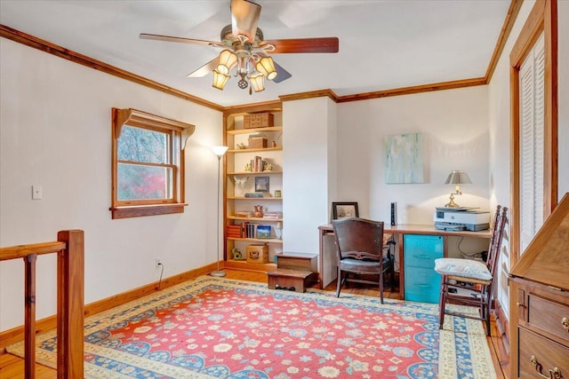 living area featuring ornamental molding, a ceiling fan, and wood finished floors