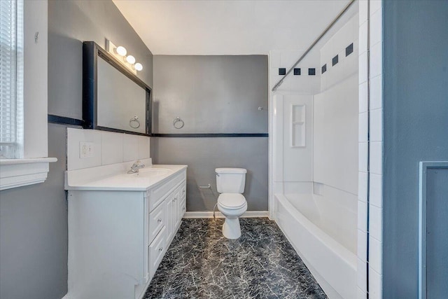 full bathroom featuring shower / tub combination, vanity, and toilet