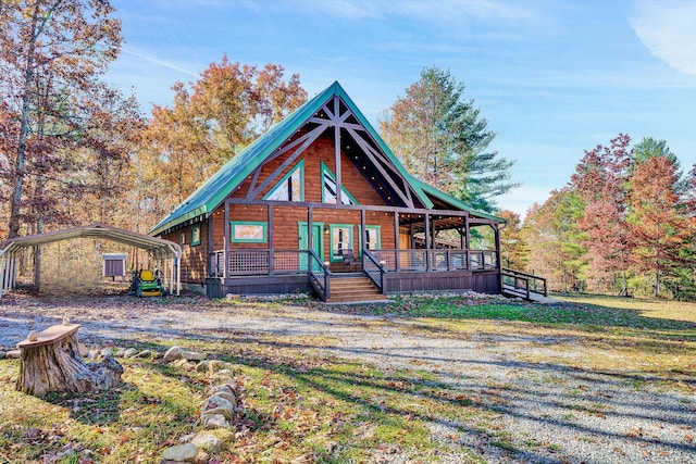 cabin featuring a porch